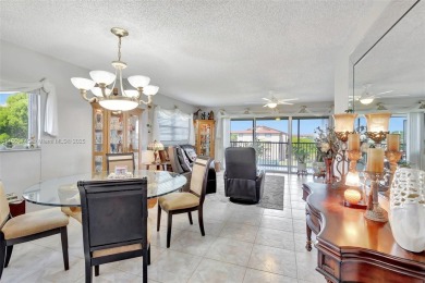 ENJOY STUNNING LAKE VIEWS from your balcony! This LARGEST CORNER on Flamingo Lakes Country Club in Florida - for sale on GolfHomes.com, golf home, golf lot
