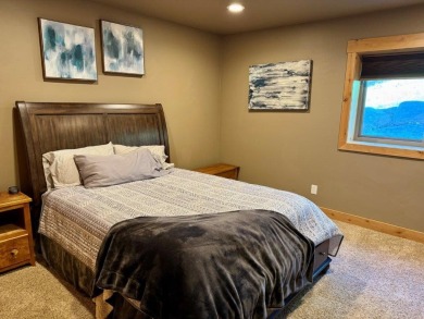 Exceptional custom-built home on over 6 acres, bordered by tens on Double Arrow Lodge in Montana - for sale on GolfHomes.com, golf home, golf lot