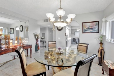 ENJOY STUNNING LAKE VIEWS from your balcony! This LARGEST CORNER on Flamingo Lakes Country Club in Florida - for sale on GolfHomes.com, golf home, golf lot