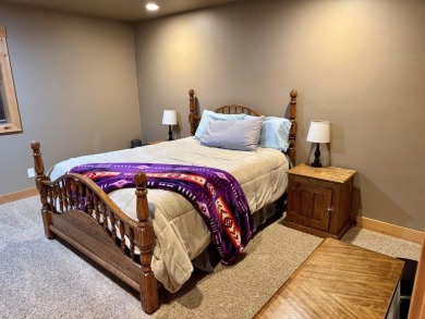 Exceptional custom-built home on over 6 acres, bordered by tens on Double Arrow Lodge in Montana - for sale on GolfHomes.com, golf home, golf lot