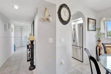 ENJOY STUNNING LAKE VIEWS from your balcony! This LARGEST CORNER on Flamingo Lakes Country Club in Florida - for sale on GolfHomes.com, golf home, golf lot