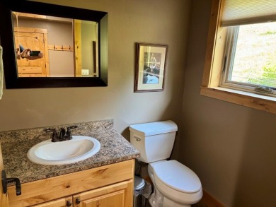 Exceptional custom-built home on over 6 acres, bordered by tens on Double Arrow Lodge in Montana - for sale on GolfHomes.com, golf home, golf lot
