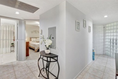 ENJOY STUNNING LAKE VIEWS from your balcony! This LARGEST CORNER on Flamingo Lakes Country Club in Florida - for sale on GolfHomes.com, golf home, golf lot