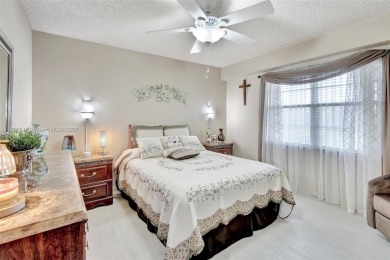 ENJOY STUNNING LAKE VIEWS from your balcony! This LARGEST CORNER on Flamingo Lakes Country Club in Florida - for sale on GolfHomes.com, golf home, golf lot
