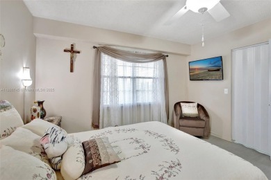 ENJOY STUNNING LAKE VIEWS from your balcony! This LARGEST CORNER on Flamingo Lakes Country Club in Florida - for sale on GolfHomes.com, golf home, golf lot