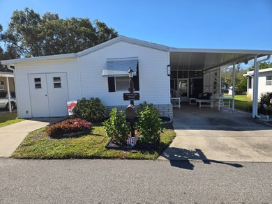 Hidden Golf and Tennis, lot 794, is the home you have been on Lake Henry Golf Club in Florida - for sale on GolfHomes.com, golf home, golf lot