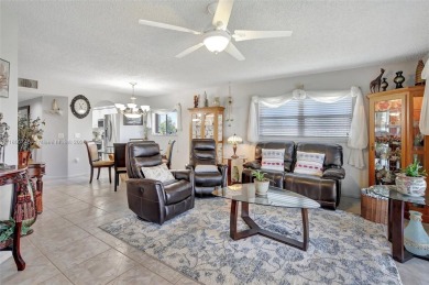 ENJOY STUNNING LAKE VIEWS from your balcony! This LARGEST CORNER on Flamingo Lakes Country Club in Florida - for sale on GolfHomes.com, golf home, golf lot