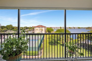 ENJOY STUNNING LAKE VIEWS from your balcony! This LARGEST CORNER on Flamingo Lakes Country Club in Florida - for sale on GolfHomes.com, golf home, golf lot