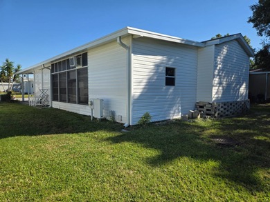 Hidden Golf and Tennis, lot 794, is the home you have been on Lake Henry Golf Club in Florida - for sale on GolfHomes.com, golf home, golf lot