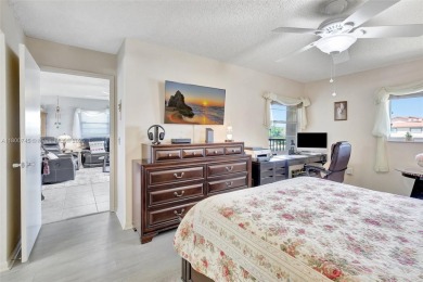 ENJOY STUNNING LAKE VIEWS from your balcony! This LARGEST CORNER on Flamingo Lakes Country Club in Florida - for sale on GolfHomes.com, golf home, golf lot