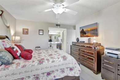 ENJOY STUNNING LAKE VIEWS from your balcony! This LARGEST CORNER on Flamingo Lakes Country Club in Florida - for sale on GolfHomes.com, golf home, golf lot