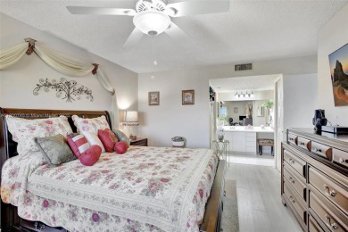 ENJOY STUNNING LAKE VIEWS from your balcony! This LARGEST CORNER on Flamingo Lakes Country Club in Florida - for sale on GolfHomes.com, golf home, golf lot