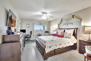 ENJOY STUNNING LAKE VIEWS from your balcony! This LARGEST CORNER on Flamingo Lakes Country Club in Florida - for sale on GolfHomes.com, golf home, golf lot