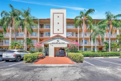 ENJOY STUNNING LAKE VIEWS from your balcony! This LARGEST CORNER on Flamingo Lakes Country Club in Florida - for sale on GolfHomes.com, golf home, golf lot