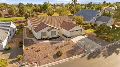 Charming one-story home located within an exclusive guard-gated on Los Prados Golf Course in Nevada - for sale on GolfHomes.com, golf home, golf lot