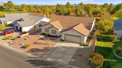 Charming one-story home located within an exclusive guard-gated on Los Prados Golf Course in Nevada - for sale on GolfHomes.com, golf home, golf lot