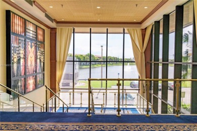 Enjoy stunning LAKE VIEWS from your 4TH FLOOR balcony! This on Flamingo Lakes Country Club in Florida - for sale on GolfHomes.com, golf home, golf lot