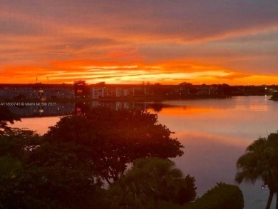 Enjoy stunning LAKE VIEWS from your 4TH FLOOR balcony! This on Flamingo Lakes Country Club in Florida - for sale on GolfHomes.com, golf home, golf lot