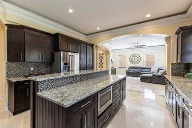 This beautifully maintained 4-bed plus den, 4-bath residence in on Valencia Golf and Country Club in Florida - for sale on GolfHomes.com, golf home, golf lot