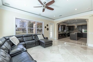 This beautifully maintained 4-bed plus den, 4-bath residence in on Valencia Golf and Country Club in Florida - for sale on GolfHomes.com, golf home, golf lot