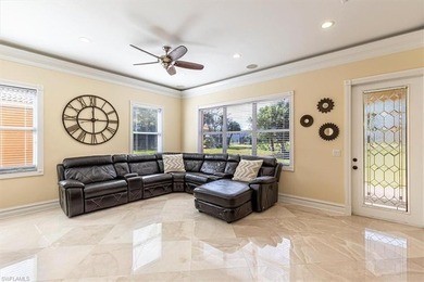 This beautifully maintained 4-bed plus den, 4-bath residence in on Valencia Golf and Country Club in Florida - for sale on GolfHomes.com, golf home, golf lot