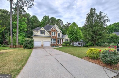 Welcome to your dream home nestled on a serene cul-de-sac within on Creekside Golf and Country Club in Georgia - for sale on GolfHomes.com, golf home, golf lot