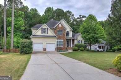 Welcome to your dream home nestled on a serene cul-de-sac within on Creekside Golf and Country Club in Georgia - for sale on GolfHomes.com, golf home, golf lot