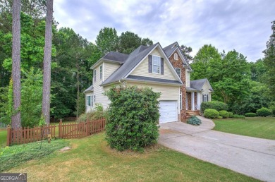 Welcome to your dream home nestled on a serene cul-de-sac within on Creekside Golf and Country Club in Georgia - for sale on GolfHomes.com, golf home, golf lot