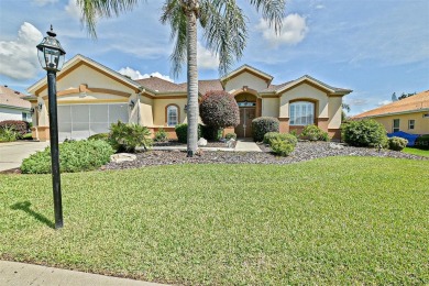 Stunning are the words you will use when you view this beautiful on Eagle Ridge At Spruce Creek Country Club in Florida - for sale on GolfHomes.com, golf home, golf lot