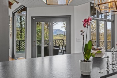 This impeccably renovated residence inside the prestigious Wade on Headwaters Golf Club in North Carolina - for sale on GolfHomes.com, golf home, golf lot
