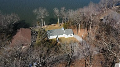 Panoramic waterfront views from this totally remodeled lake home on Boots Randolph Golf Course in Kentucky - for sale on GolfHomes.com, golf home, golf lot