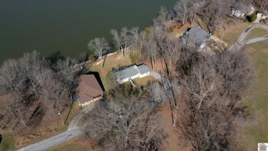 Panoramic waterfront views from this totally remodeled lake home on Boots Randolph Golf Course in Kentucky - for sale on GolfHomes.com, golf home, golf lot