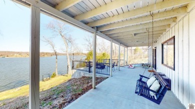 Panoramic waterfront views from this totally remodeled lake home on Boots Randolph Golf Course in Kentucky - for sale on GolfHomes.com, golf home, golf lot