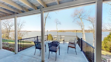 Panoramic waterfront views from this totally remodeled lake home on Boots Randolph Golf Course in Kentucky - for sale on GolfHomes.com, golf home, golf lot