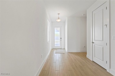 Welcome to this beautifully appointed Teak Villa by Toll on Babcock National Golf Course in Florida - for sale on GolfHomes.com, golf home, golf lot