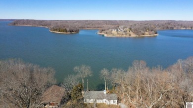 Panoramic waterfront views from this totally remodeled lake home on Boots Randolph Golf Course in Kentucky - for sale on GolfHomes.com, golf home, golf lot