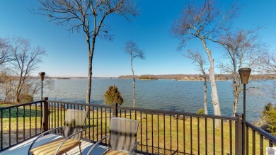 Panoramic waterfront views from this totally remodeled lake home on Boots Randolph Golf Course in Kentucky - for sale on GolfHomes.com, golf home, golf lot