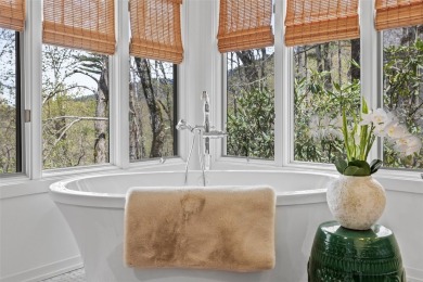 This impeccably renovated residence inside the prestigious Wade on Headwaters Golf Club in North Carolina - for sale on GolfHomes.com, golf home, golf lot