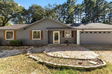 Charming Corner Lot nestled in the serene, gated community of on Holly Lake Ranch Golf Club in Texas - for sale on GolfHomes.com, golf home, golf lot