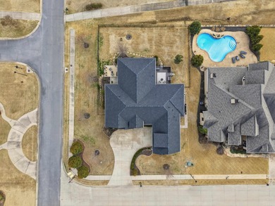 Welcome to this exceptional home overlooking the 14th hole at on Centennial Valley Golf Course in Arkansas - for sale on GolfHomes.com, golf home, golf lot