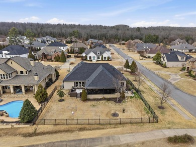 Welcome to this exceptional home overlooking the 14th hole at on Centennial Valley Golf Course in Arkansas - for sale on GolfHomes.com, golf home, golf lot
