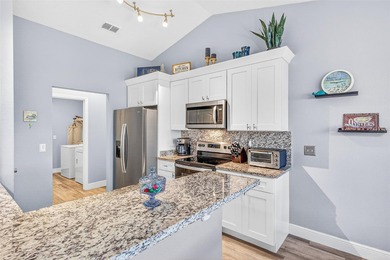 Links-Front Living: Fully Renovated & Move-In Ready on the 14th on Black Bear Golf Club in Florida - for sale on GolfHomes.com, golf home, golf lot