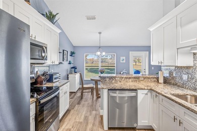 Links-Front Living: Fully Renovated & Move-In Ready on the 14th on Black Bear Golf Club in Florida - for sale on GolfHomes.com, golf home, golf lot