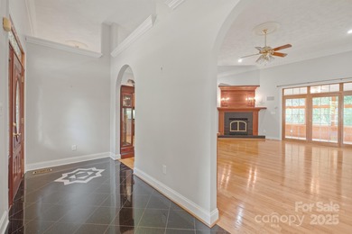 Spacious mostly brick home with main level living located in the on Granada Farms Country Club in North Carolina - for sale on GolfHomes.com, golf home, golf lot