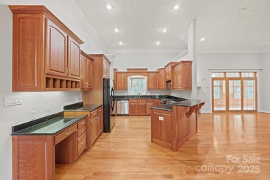 Spacious mostly brick home with main level living located in the on Granada Farms Country Club in North Carolina - for sale on GolfHomes.com, golf home, golf lot