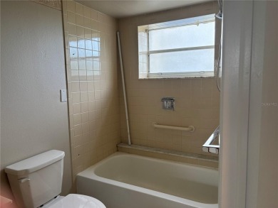 This spacious third-floor end unit offers true resort-type on Feather Sound Country Club in Florida - for sale on GolfHomes.com, golf home, golf lot