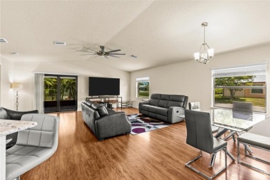 Clean. Crisp. Carefree. This 2020 CBS home has been so lightly on Spanish Lakes Country Club in Florida - for sale on GolfHomes.com, golf home, golf lot