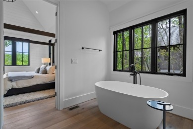 Between two North Carolina mountain ridges lies an expansive on Headwaters Golf Club in North Carolina - for sale on GolfHomes.com, golf home, golf lot