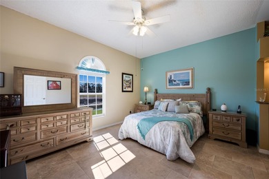 This beautifully maintained Mediterranean Carriage home on Palm Aire Country Club of Sarasota in Florida - for sale on GolfHomes.com, golf home, golf lot