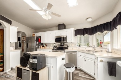 No lot rent here--this home and the land beneath it are yours! on 3 Parks Fairways in Arizona - for sale on GolfHomes.com, golf home, golf lot
